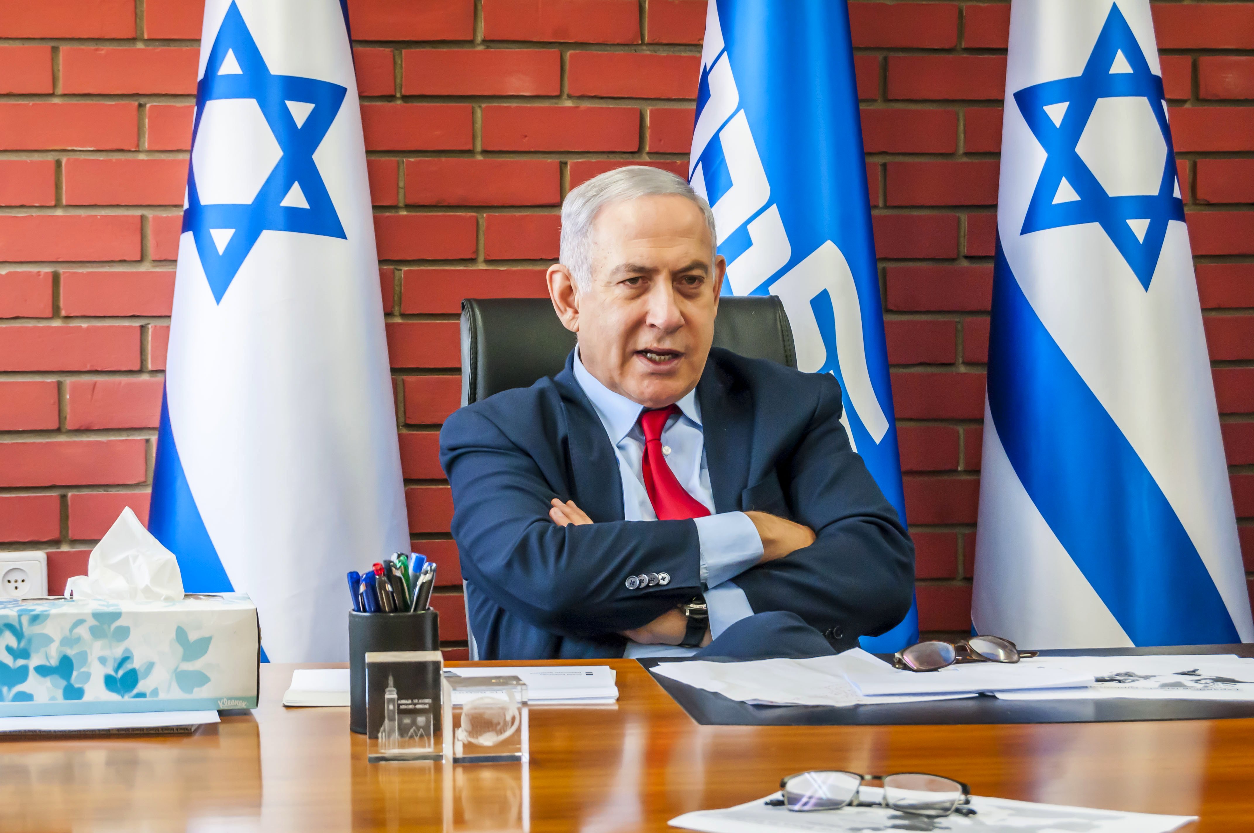 netanyahu speaking with reporters