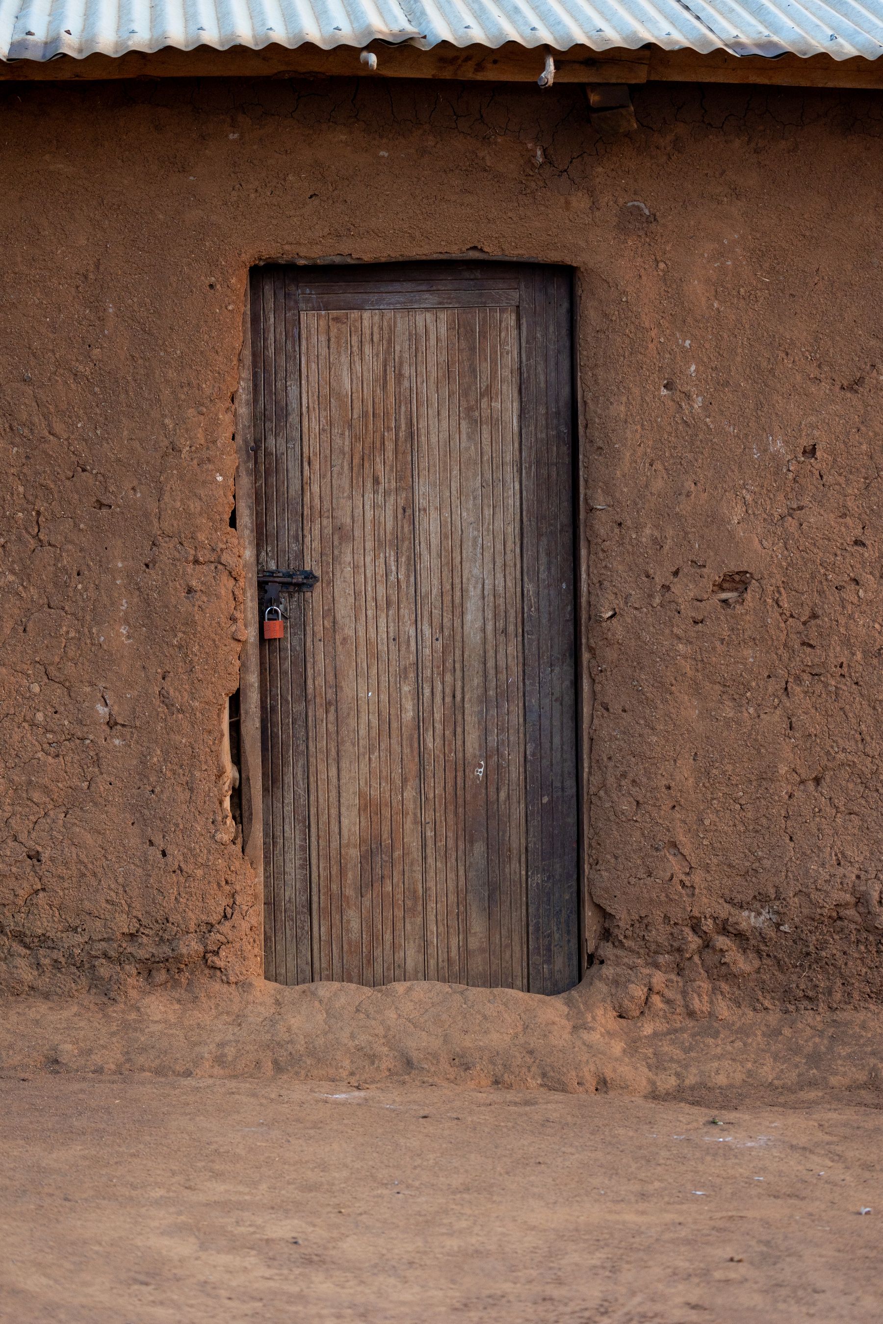 Wood Door in Mud Wall