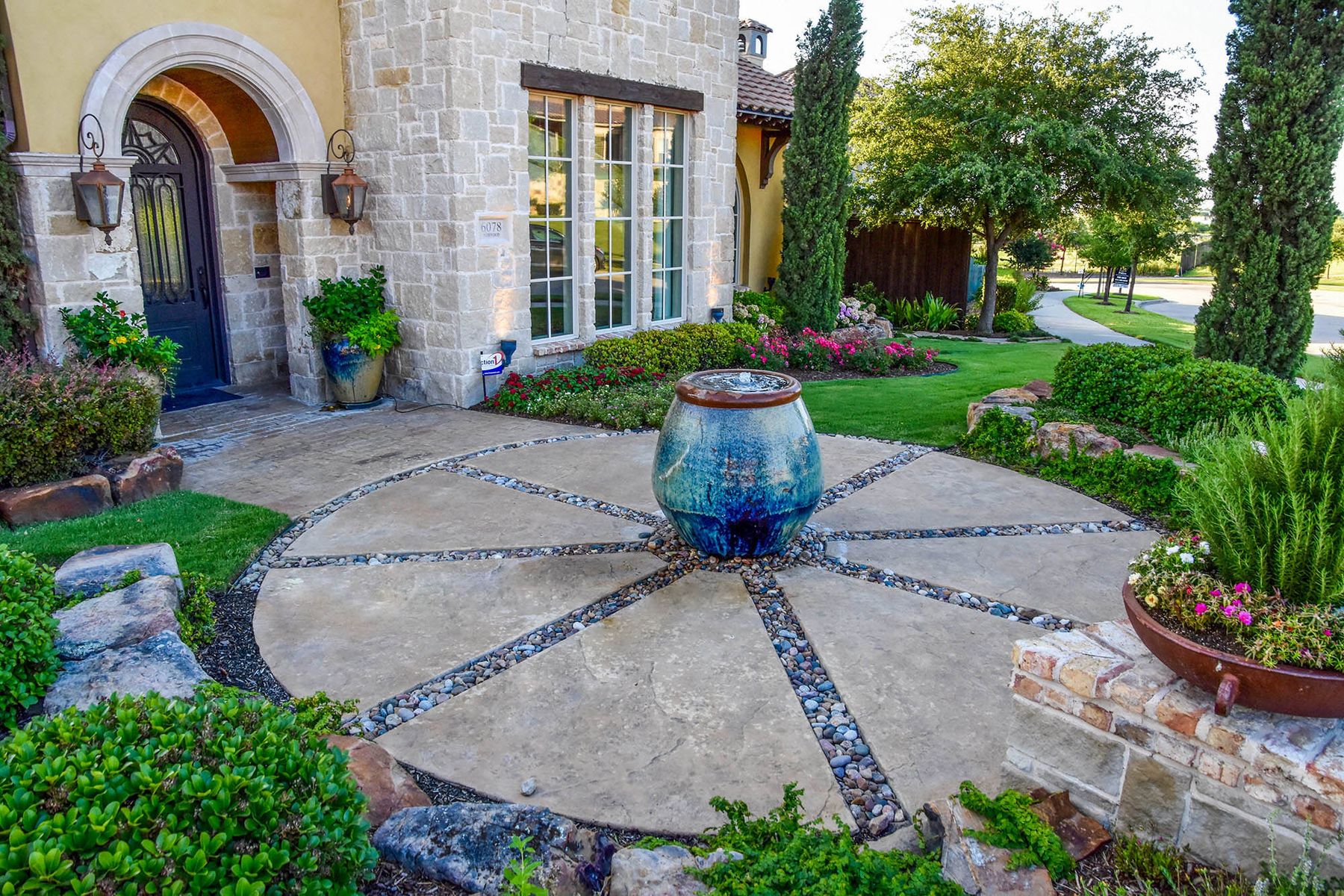 Downing Residence: This Disappearing Fountain Does Anything But!