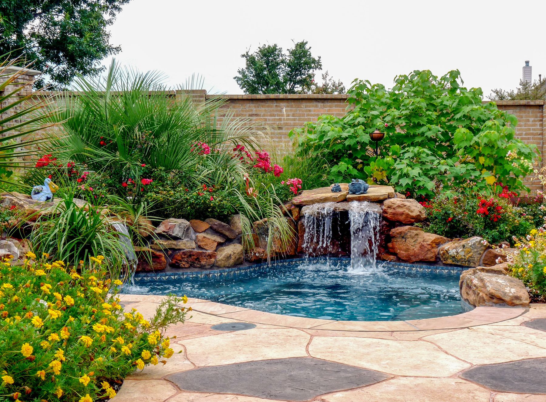 Teal Residence Tropical Wading Pool with Waterfalls