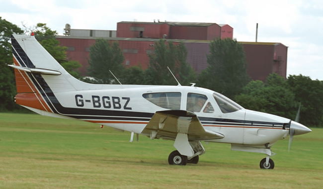 An airplane: Rockwell  Commander taken during Wings, Wheels & Steam, Rougham, 26/27-06-2004