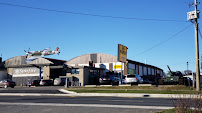 K-W Surplus