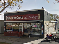 ATM Machine at Sports Cuts Barber Shop