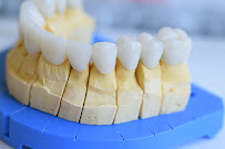 Dental Lesseps | Implants & Ortodòncia