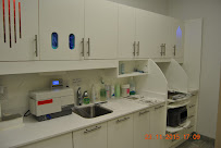 Dental Solutions - Dr. J. Gangwani & Dr. Mike Narayansingh (Orthodontics, Cosmetic, General, Emergency)