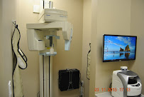 Dental Solutions - Dr. J. Gangwani & Dr. Mike Narayansingh (Orthodontics, Cosmetic, General, Emergency)