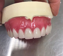 Gus Koroneos Denture & Implant Solutions