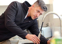 The Plumber Next Door