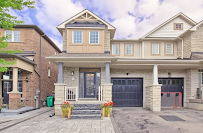 Kim Woollett, Real Estate Broker