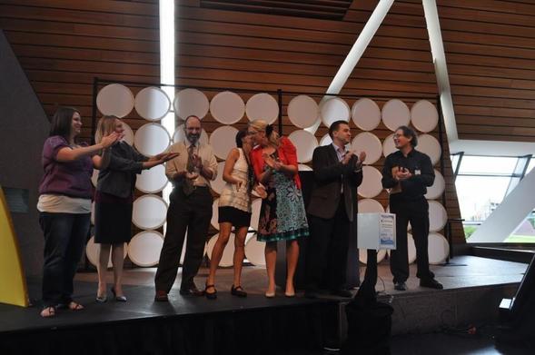 Photograph of Pecha Kucha presenters (including Adrian Segar, far right) at Event Camp Twin Cities 2011