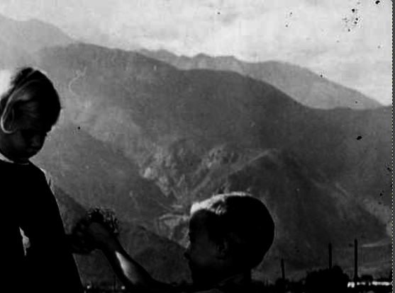 Photo blown up and contrast adjusted to show hills