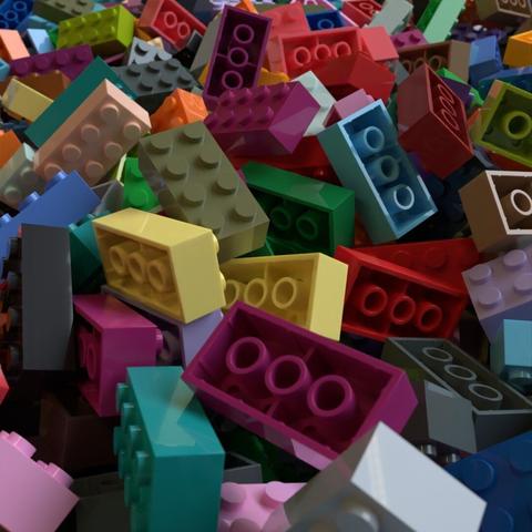 3D rendering of a pile of lego bricks, stretching off into the distance.