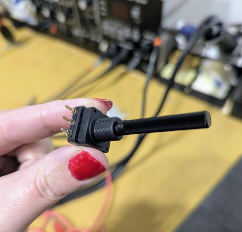 250 kohm potentiometer with plastic housing to ensure it doesn't short against the flyback shielding.