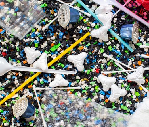 Photo shows a mix of plastic trash types.