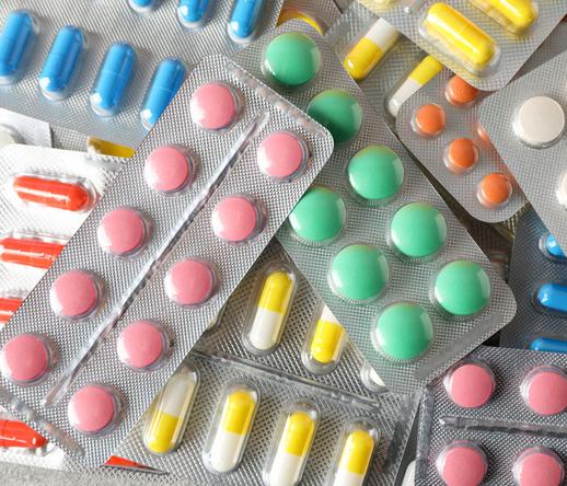 Photo shows multiple types of over-the-counter drugs packaged in packs made of plastic, foil and other material.