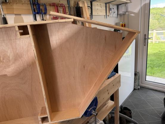 The baseboard is in its side, one side piece is remaining to be cut to length