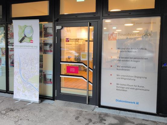 OSM-AT Banner vor dem BWS Elisabeth-Vorstadt in Salzburg