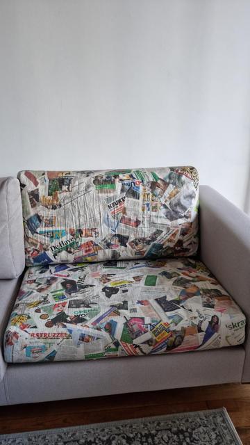 Half of the sofa assembled together - now it has a newspaper pattern and texture!