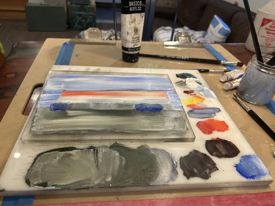 Second to last blocking colors and brush work over the sky, bus, and asphalt. There are margins of unpainted plate.