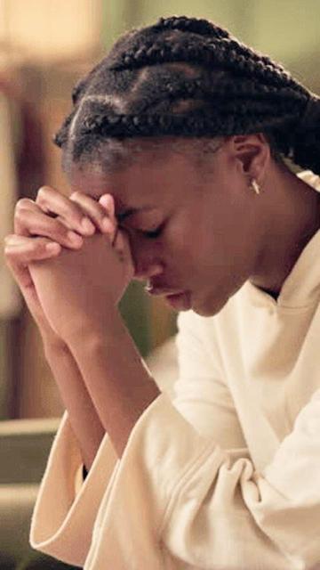 A beautiful woman praying