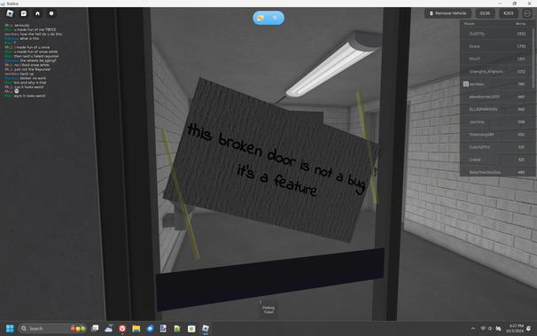 A sign attached to a glass door window in a Roblox game that reads "this broken door is not a bug, it's a feature". The sign was found in a Roblox game called "Car Parking Level 7" in October 2024.