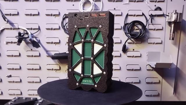 [ImageSource: Chris Doel]

Many different vapes use the same cell types on the inside, and once one has 35 identical cells in healthy condition it’s just a matter of using a compatible 3D-printed enclosure with two PCBs to connect the cells, and a pre-made board handles the power bank functionality, including recharging.

👾I’m like to highlight a few design features that strike me as interesting. One is the three little bendy “wings” that cradle each cell, ensuring cells are centered and held snugly even if they aren’t exactly the right size. Another is the use of spring terminals to avoid the need to solder to individual cells. The PCBs themselves also double as cell balancers, providing a way to passively balance all 35 cells and ensure they are at the same voltage level during initial construction.👾

After the cells are confirmed to be balanced, a solder jumper near each terminal is closed to bypass that functionality for final assembly.