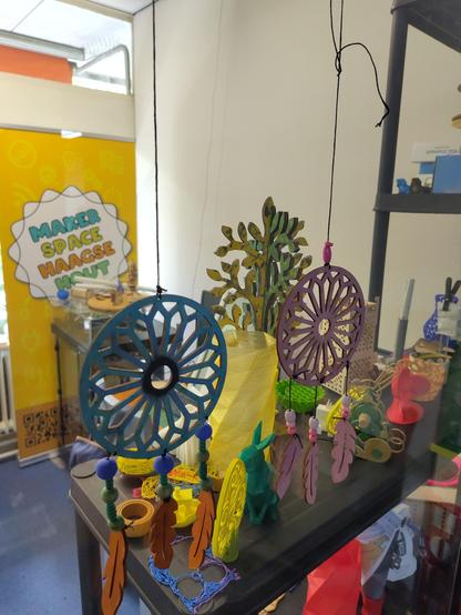 Dreamcatchers with our logo in the background.