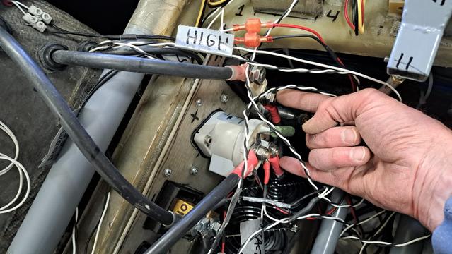 High-voltage high-current terminals, marked in red, are exposed. Murphy's Law means that something will fall on them and short to ground, possibly causing a fire. I need to cover them.