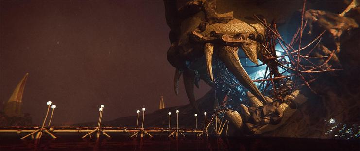 Wide shot, exterior, day -

A giant skull with half rotten flesh dripping from its sides sits propped up against a mound of the fleshy ground of the Gore Fields.  A cool blue light emits from within the mouth opening.  A walkway and stairs have been built to cross the blood lake in front of the skull and up into it's cranial cavity, where the light comes from.