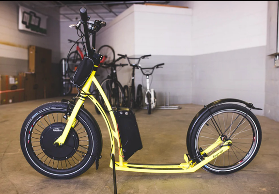 A kickbike that has been electrified. Battery is outside and relaxeable. Everything has bike parts which are repairable.