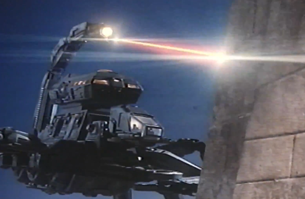 a cool scorpion mega robot shooting a laser at a pyramid
