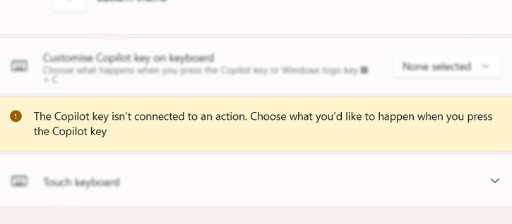 We have a screenshot of Windows settings. Highlighted in yellow is the following information: 'The Copilot key isn't connected to an action. Choose what you'd like to happen when you press the Copilot key.'
