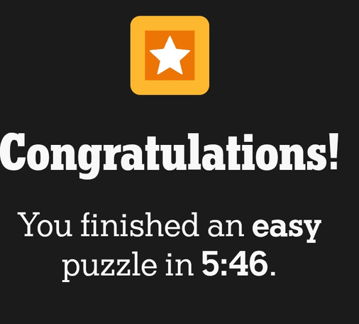 Congratulations message! The text on a dark gray background reads "Congratulations! You finished an easy puzzle in 5:46." Above the text is a gold square containing a white star.