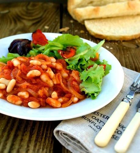 Greek Beans stew served with salad and crusty bread.