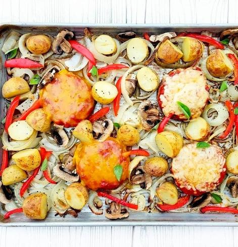 Burger onion and veg bake in a sheet pan.