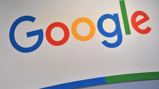 A large Google logo at a trade fair.