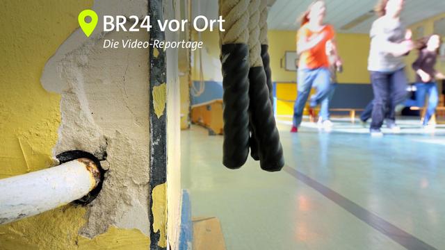 Kinder machen in einer maroden Schulturnhalle Sport. (Symbolbild)