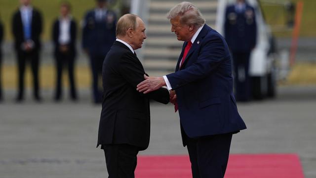 President Donald Trump greets Russia's President Vladimir Putin Friday, Aug. 15, 2025, at Joint Base Elmendorf-Richardson, Alaska. (AP Photo/Julia Demaree Nikhinson)