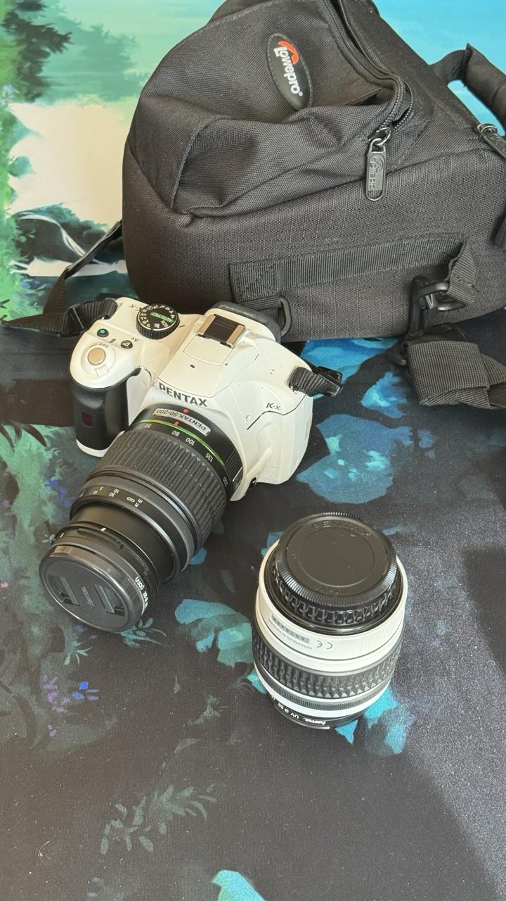 Kamera, Tasche, Objektiv.