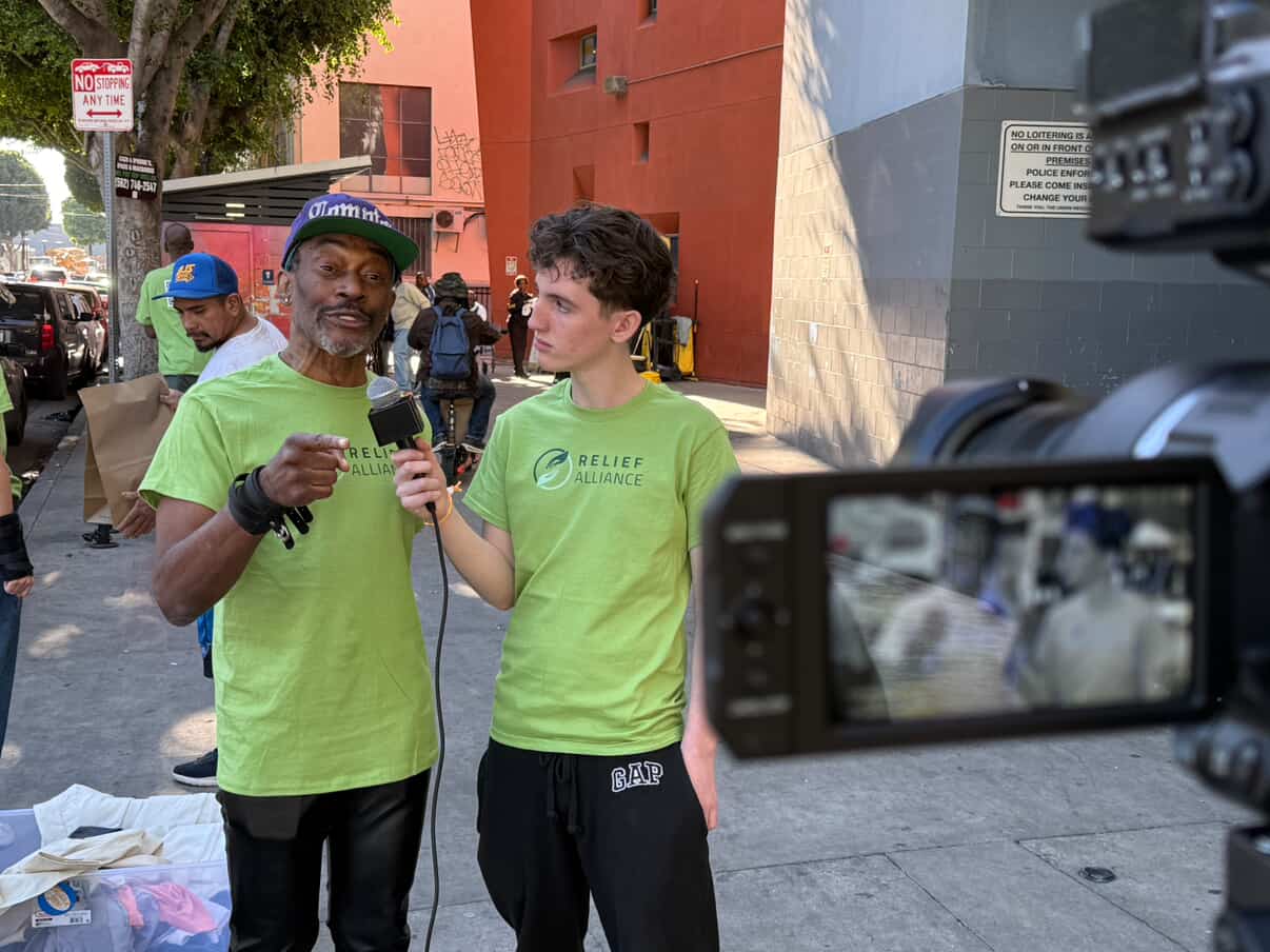 aiden-mcnally-interviewing-lejon-stewart-relief-alliance-skid-row.jpg.jpg Aiden McNally speaking with Lejon Stewart during a Relief Alliance outreach event focused on bringing awareness and support to the homeless community